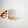 White ceramic mug with natural bottom rim
